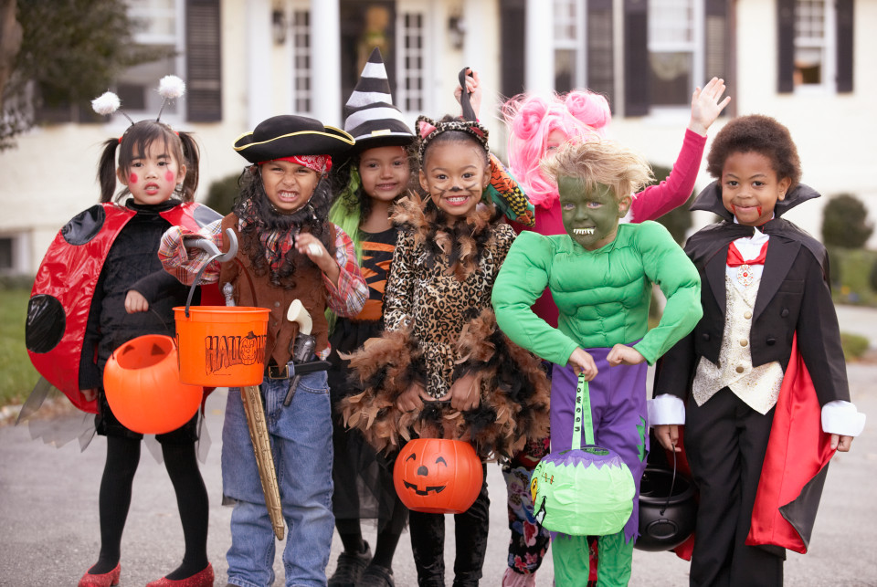 Kids dressed up in Halloween costumes